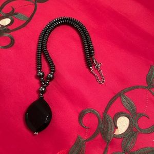 Lovely black pendant necklace.